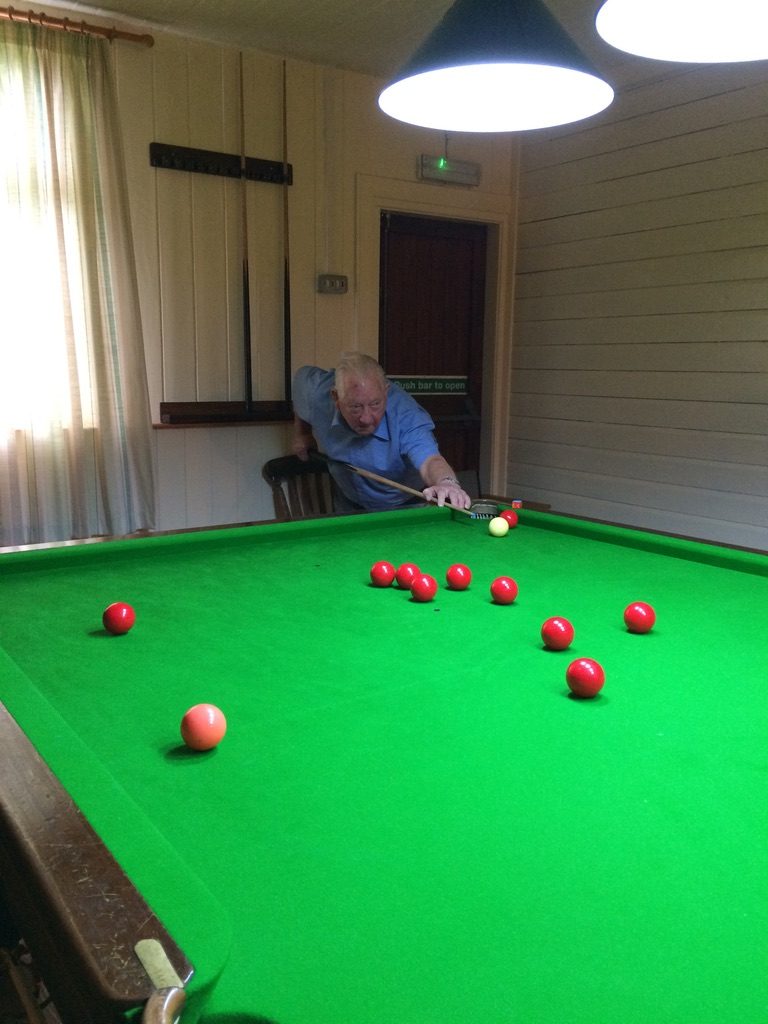 Snooker being played in the games room